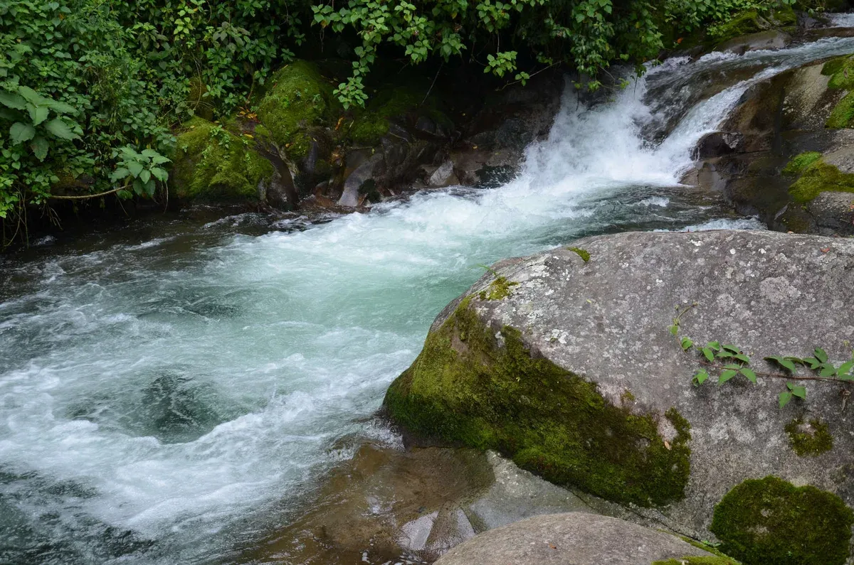 Laguna Azul, the pale blue pool on the Rio Celeste in Tenorio Volcano National Park, Costa Rica
